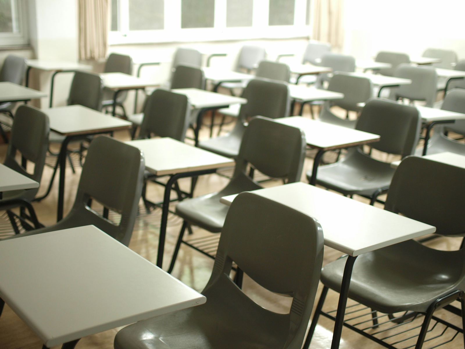 Students taking exams in a classroom